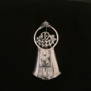 Silver bubblegum machine pin